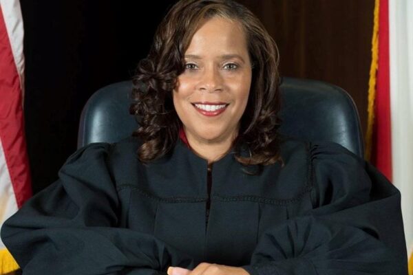 Lora Cubbage as Deputy City Attorney