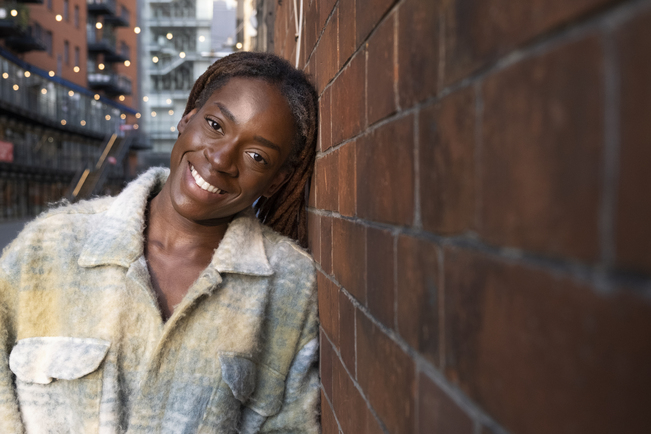 woman smiling in blackest count NC